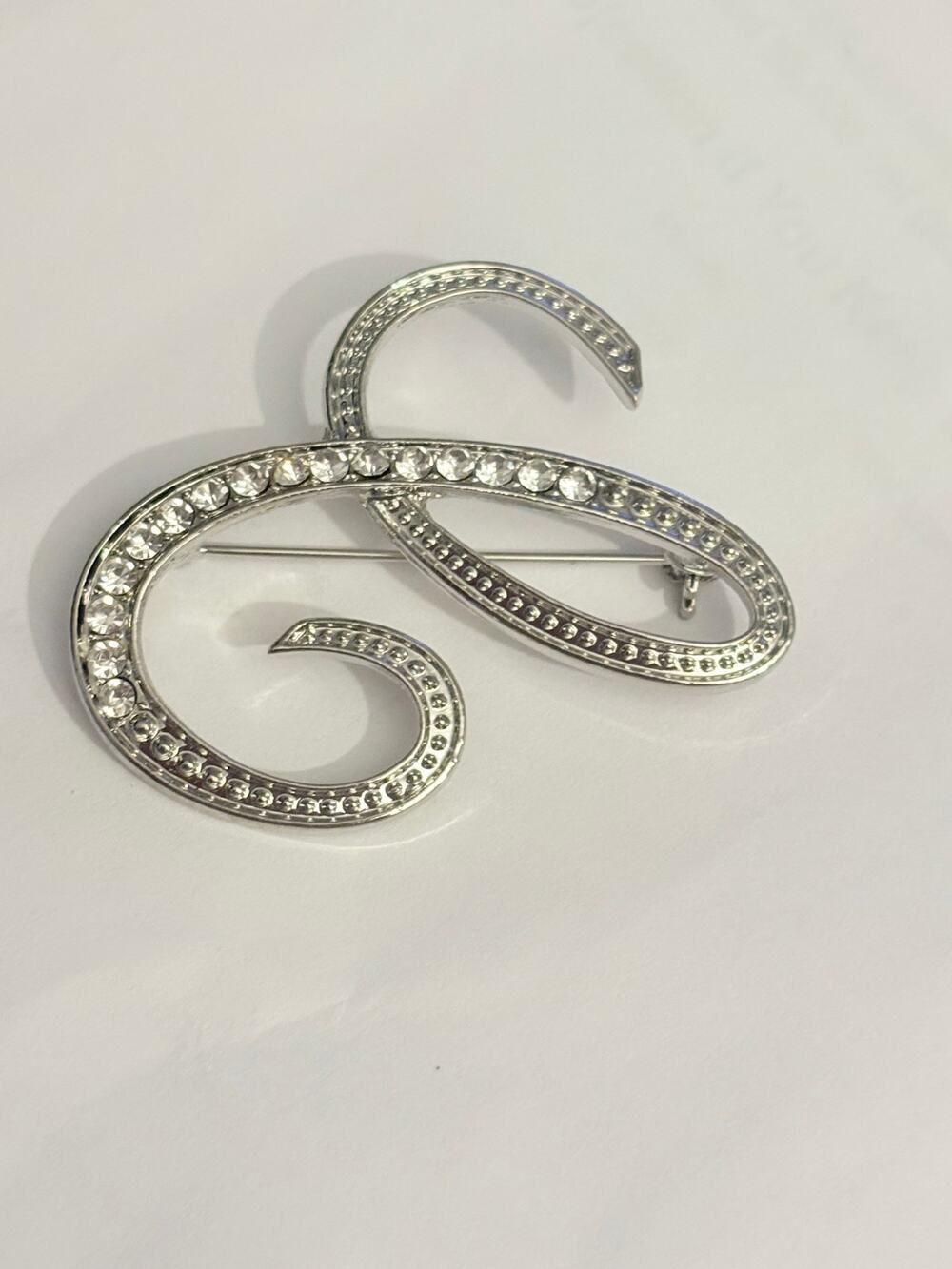 Silver Tone Rhinestone Scroll Ribbon Brooch Pin